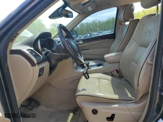 2014 Jeep Grand Cherokee Overland with VIN 1C4RJFCT1EC379867, listed as a Copart auction lot 54106375 with 217,908 mi miles and Clean Title. Bid and sale history available at carsss.com. Image 7.