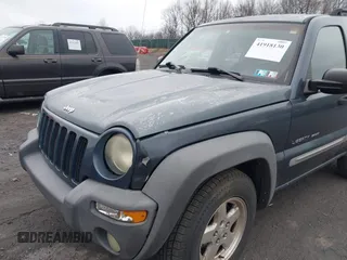 2002 Jeep Liberty Sport with VIN 1J8GL48K62W298212, listed as a IAAI auction lot 41918130 with 226,299 mi miles. Bid and sale history available at carsss.com. Image 6.