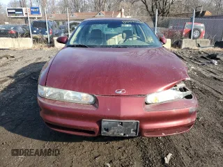 2000 Oldsmobile Intrigue GLS z VIN 1G3WX52H4YF155701, wystawiony jako Copart lot #86526684 z przebiegiem 110 694 mil mil oraz Szkoda całkowita • Salvage title. Historia ofert i sprzedaży dostępna na DreamBid. Obrazek 5.