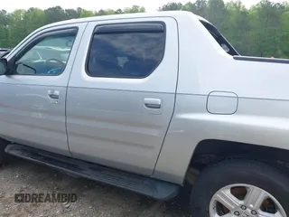 2009 Honda Ridgeline RTL with VIN 2HJYK16539H500986, listed as a IAAI auction lot 42084176 with 161,142 mi miles and . Bid and sale history available at DreamBid. Image 14.