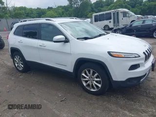 2014 Jeep Cherokee Limited z VIN 1C4PJMDB6EW108822, wystawiony jako IAAI lot #42397010 z przebiegiem 99 533 mil mil oraz . Historia ofert i sprzedaży dostępna na DreamBid. Obrazek 1.