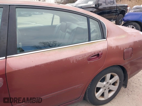 2002 Nissan Altima S with VIN 1N4AL11DX2C216559, listed as a IAAI auction lot 41540001 with 112,084 mi miles. Bid and sale history available at carsss.com. Image 16.