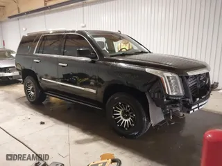 2015 Cadillac Escalade Premium with VIN 1GYS4CKJ5FR150611, listed as a IAAI auction lot 41571036 with 203,806 mi miles. Bid and sale history available at carsss.com. Image 1.