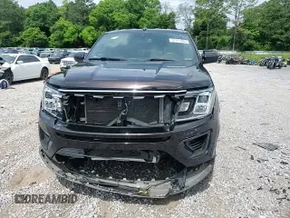 2021 Ford Expedition XLT with VIN 1FMJU1HT0MEA03496, listed as a Copart auction lot 57911685 with 96,462 mi miles and Salvage title. Bid and sale history available at DreamBid. Image 15.