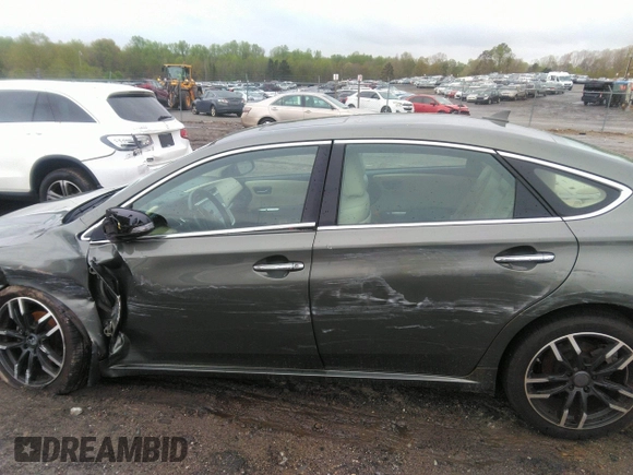 2014 Toyota Avalon Limited with VIN 4T1BK1EBXEU109256, listed as a IAAI auction lot 41908504 with 84,472 mi miles and . Bid and sale history available at DreamBid. Image 13.