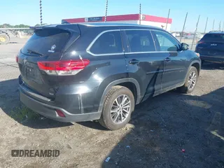 2018 Toyota Highlander SE with VIN 5TDKZRFH1JS529875, listed as a IAAI auction lot 42181502 with 182,652 mi miles and . Bid and sale history available at DreamBid. Image 4.
