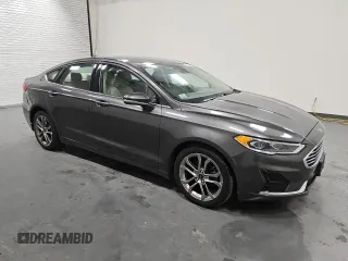 2020 Ford Fusion SEL with VIN 3FA6P0CD9LR137274, listed as a Copart auction lot 57070035 with 65,707 mi miles and Clean title. Bid and sale history available at DreamBid. Image 4.