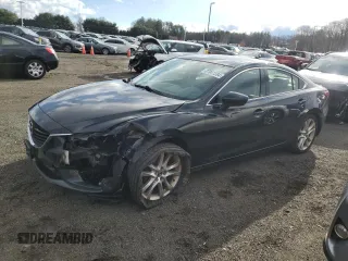 2014 Mazda 6 i Touring with VIN JM1GJ1V59E1108057, listed as a Copart auction lot 87041284 with 153,847 mi miles and Salvage title. Bid and sale history available at DreamBid. Image 1.