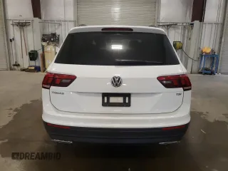 2018 Volkswagen Tiguan S with VIN 3VV1B7AX4JM118670, listed as a Copart auction lot 57055935 with 104,443 mi miles and Salvage title. Bid and sale history available at DreamBid. Image 6.