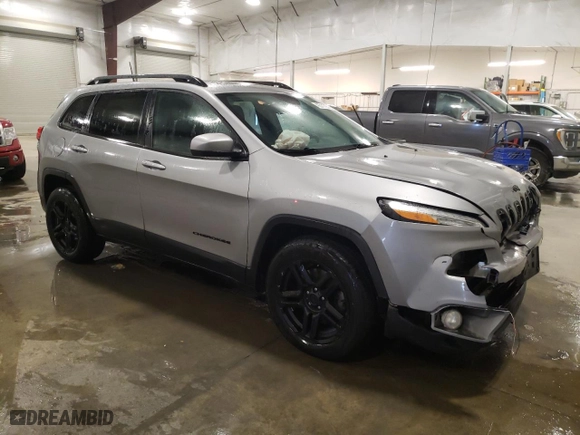 2016 Jeep Cherokee Altitude with VIN 1C4PJMCS8GW122127, listed as a Copart auction lot 42311735 with 154,047 mi miles and Salvage Title. Bid and sale history available at carsss.com. Image 4.