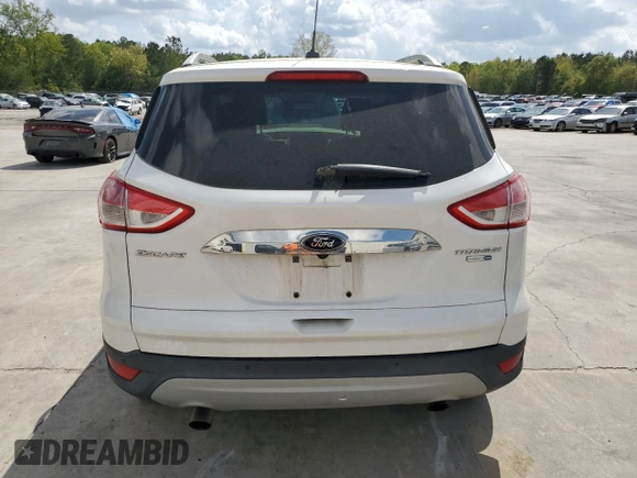 2016 Ford Escape Titanium with VIN 1FMCU9J94GUB31594, listed as a Copart auction lot 51690565 with 119,699 mi miles and Salvage Title. Bid and sale history available at DreamBid. Image 6.