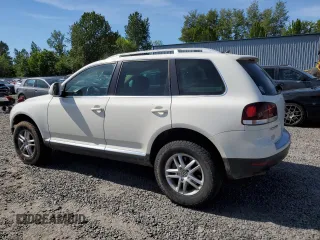 2008 Volkswagen Touareg V6 z VIN WVGBE77L68D012544, wystawiony jako Copart lot #58716985 z przebiegiem 148 637 mil mil oraz Czysty tytuł • Clean title. Historia ofert i sprzedaży dostępna na DreamBid. Obrazek 2.