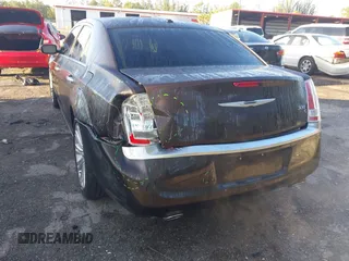 2012 Chrysler 300 C Luxury Series with VIN 2C3CCAPT3CH251755, listed as a IAAI auction lot 41935653 with 62,397 mi miles and . Bid and sale history available at carsss.com. Image 6.
