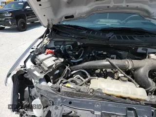 2021 Ford F-150 XL z VIN 1FTEW1CP2MFC45887, wystawiony jako Copart lot #71846755 z przebiegiem 56 977 mil mil oraz Szkoda całkowita • Salvage title. Historia ofert i sprzedaży dostępna na DreamBid. Obrazek 16.