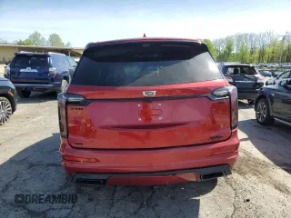 2024 Cadillac XT6 AWD Sport with VIN 1GYKPHRS4RZ715079, listed as a Copart auction lot 55297235 with 18,283 mi miles and Salvage title. Bid and sale history available at DreamBid. Image 6.