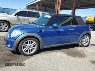 2014 MINI Convertible with VIN WMWZN3C58ET861186, listed as a Copart auction lot 50585755 with 81,459 mi miles and Salvage Title. Bid and sale history available at DreamBid. Image 1.