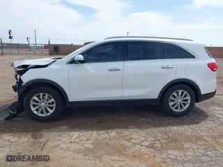 2016 Kia Sorento LX with VIN 5XYPG4A51GG023545, listed as a IAAI auction lot 41923123 with 168,438 mi miles. Bid and sale history available at carsss.com. Image 14.