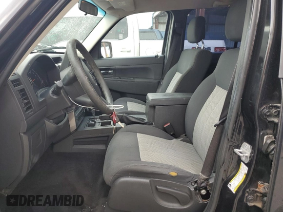 2010 Jeep Liberty Sport with VIN 1J4PN2GK3AW105918, listed as a Copart auction lot 63023885 with 199,366 mi miles and Salvage title. Bid and sale history available at DreamBid. Image 7.