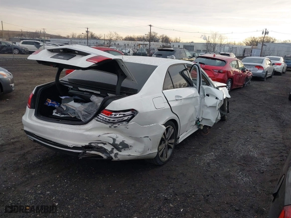 2016 Mercedes-Benz E-Class E 350 Sport with VIN WDDHF5KB6GB237450, listed as a IAAI auction lot 41297976 with 60,573 mi miles. Bid and sale history available at carsss.com. Image 4.