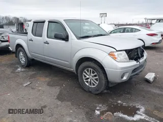 2014 Nissan Frontier SV with VIN 1N6AD0ER6EN709071, listed as a IAAI auction lot 41695723 with 130,834 mi miles and . Bid and sale history available at DreamBid. Image 1.