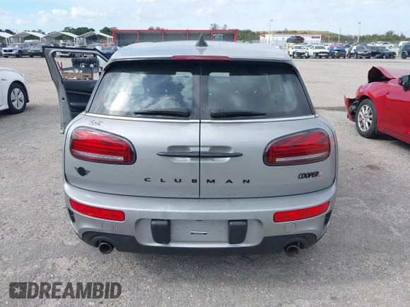 2023 MINI Clubman Cooper S with VIN WMWXJ1C03P2U08484, listed as a IAAI auction lot 41056651 with 12,948 mi miles. Bid and sale history available at carsss.com. Image 16.