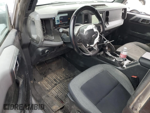 2022 Ford Bronco with VIN 1FMEE5DP1NLA98307, listed as a Copart auction lot 47690365 with 34,490 mi miles and Salvage Title. Bid and sale history available at DreamBid. Image 8.