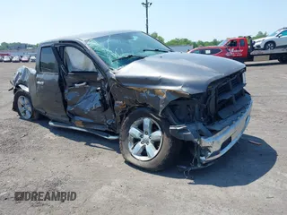 2015 Ram 1500 Big Horn z VIN 1C6RR7GT9FS604186, wystawiony jako IAAI lot #38475996 z przebiegiem 60 571 mil mil oraz . Historia ofert i sprzedaży dostępna na DreamBid. Obrazek 1.