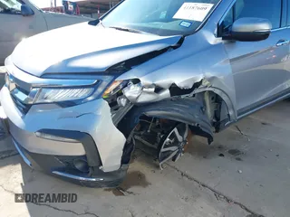2020 Honda Pilot Touring 8-Passenger with VIN 5FNYF6H95LB021455, listed as a IAAI auction lot 41187609 with 35,589 mi miles and . Bid and sale history available at DreamBid. Image 6.