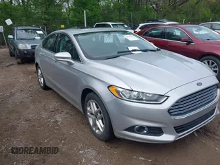 2014 Ford Fusion SE with VIN 3FA6P0HD9ER142812, listed as a IAAI auction lot 42135900 with 174,402 mi miles. Bid and sale history available at carsss.com. Image 1.