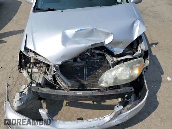 2005 Toyota Corolla CE z VIN 1NXBR32E35Z479700, wystawiony jako Copart lot #60622345 z przebiegiem 235 681 mil mil oraz Szkoda całkowita • Salvage title. Historia ofert i sprzedaży dostępna na DreamBid. Obrazek 11.