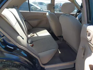 1999 Ford Escort LX with VIN 1FAFP10P3XW287792, listed as a IAAI auction lot 41807938 with 247,141 mi miles. Bid and sale history available at carsss.com. Image 8.