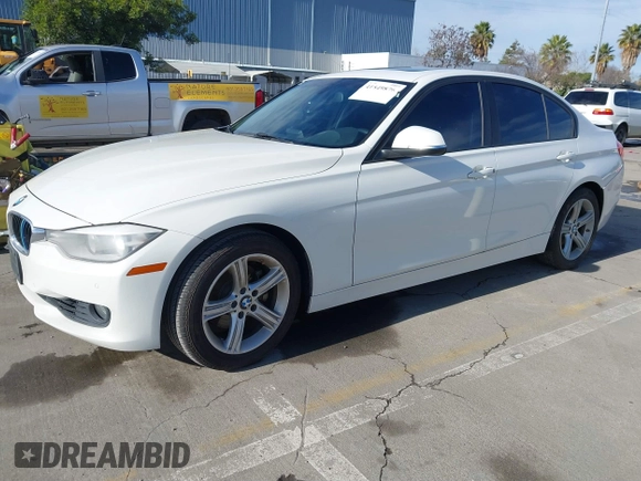 2015 BMW 3 Series 328i with VIN WBA3C1C52FK119339, listed as a IAAI auction lot 41549876 with 148,347 mi miles and . Bid and sale history available at carsss.com. Image 2.