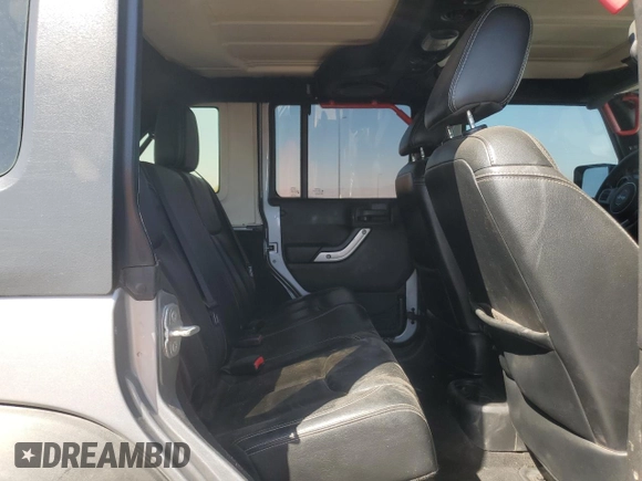 2014 Jeep Wrangler Unlimited Rubicon X with VIN 1C4BJWFG2EL308077, listed as a Copart auction lot 54439265 with 160,746 mi miles and Salvage title. Bid and sale history available at DreamBid. Image 11.