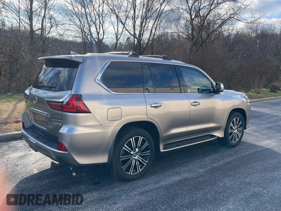 2020 Lexus LX 570 with VIN JTJDY7AX7L4332820, listed as a Copart auction lot 85960234 with 102,384 mi miles and Clean title. Bid and sale history available at DreamBid. Image 4.