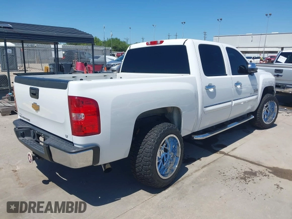 2013 Chevrolet Silverado 1500 LT with VIN 3GCPCSE05DG138211, listed as a IAAI auction lot 41966581 with 112,848 mi miles and . Bid and sale history available at DreamBid. Image 4.