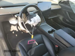 2021 Tesla Model 3 Standard Range Plus with VIN 5YJ3E1EA8MF874156, listed as a Copart auction lot 46323505 with Not Provided miles and Salvage Title. Bid and sale history available at DreamBid. Image 8.