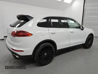 2016 Porsche Cayenne with VIN WP1AA2A28GLA01613, listed as a Copart auction lot 46182805 with 121,911 mi miles and Clean Title. Bid and sale history available at carsss.com. Image 3.
