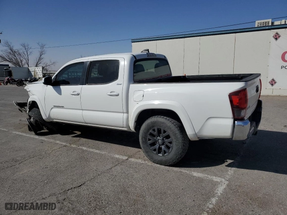 2022 Toyota Tacoma 4WD SR with VIN 3TMCZ5AN6NM462044, listed as a Copart auction lot 47292755 with 64,596 mi miles and Salvage Title. Bid and sale history available at carsss.com. Image 2.