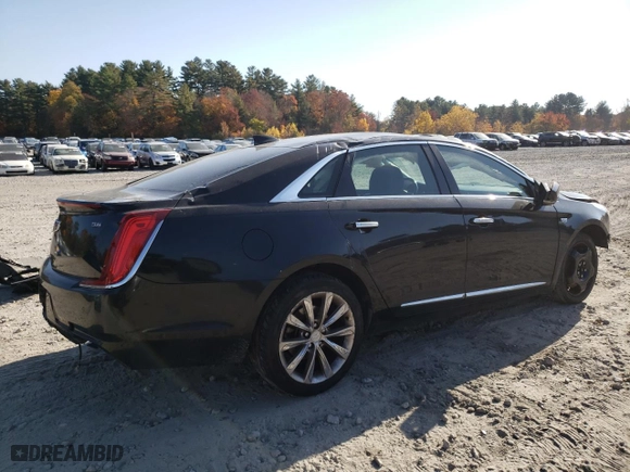 2018 Cadillac XTS Livery Package with VIN 2G61U5S38J9148386, listed as a Copart auction lot 77175064 with 96,542 mi miles and Salvage Title. Bid and sale history available at carsss.com. Image 3.