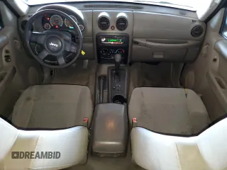 2005 Jeep Liberty Sport with VIN 1J4GK48K45W664323, listed as a Copart auction lot 53851855 with 323,695 mi miles and Salvage Title. Bid and sale history available at DreamBid. Image 8.