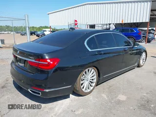 2016 BMW 7 Series 740i with VIN WBA7E2C55GG547752, listed as a IAAI auction lot 41992704 with Not Provided miles and . Bid and sale history available at carsss.com. Image 4.