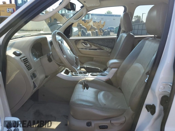 2007 Mercury Mariner Premier with VIN 4M2CU97107KJ12925, listed as a Copart auction lot 62371895 with 141,576 mi miles and Salvage title. Bid and sale history available at DreamBid. Image 7.
