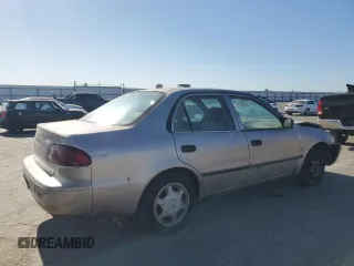 1998 Toyota Corolla VE with VIN 1NXBR12E3WZ093073, listed as a Copart auction lot 58270705 with 303,875 mi miles and Salvage title. Bid and sale history available at DreamBid. Image 3.