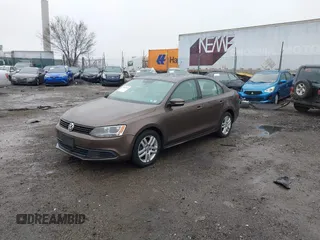 2011 Volkswagen Jetta Sedan SE w/Convenience & Sunroof PZEV with VIN 3VWDZ7AJ6BM374004, listed as a IAAI auction lot 41859636 with 236,113 mi miles. Bid and sale history available at carsss.com. Image 2.