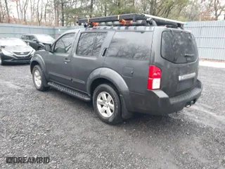 2012 Nissan Pathfinder SV with VIN 5N1AR1NBXCC611355, listed as a IAAI auction lot 41517590 with 128,870 mi miles. Bid and sale history available at carsss.com. Image 3.