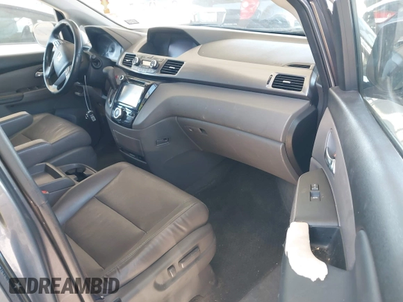 2015 Honda Odyssey EX-L z VIN 5FNRL5H68FB025338, wystawiony jako IAAI lot #41760096 z przebiegiem 181 252 mil mil oraz . Historia ofert i sprzedaży dostępna na DreamBid. Obrazek 5.