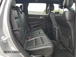 2015 Jeep Grand Cherokee Overland with VIN 1C4RJECG4FC808241, listed as a Copart auction lot 59699685 with 67,542 mi miles and Salvage title. Bid and sale history available at DreamBid. Image 11.