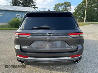 2023 Jeep Grand Cherokee Summit with VIN 1C4RJHEG2P8882566, listed as a Copart auction lot 65095905 with 59,970 mi miles and Salvage title. Bid and sale history available at DreamBid. Image 15.