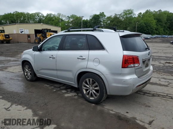 2012 Kia Sorento SX with VIN 5XYKWDA29CG267330, listed as a Copart auction lot 58859445 with 208,264 mi miles and Clean title. Bid and sale history available at DreamBid. Image 2.