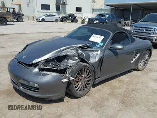 2007 Porsche Boxster S z VIN WP0CB29887U731046, wystawiony jako IAAI lot #42191204 z przebiegiem 153 037 mil mil oraz . Historia ofert i sprzedaży dostępna na DreamBid. Obrazek 2.